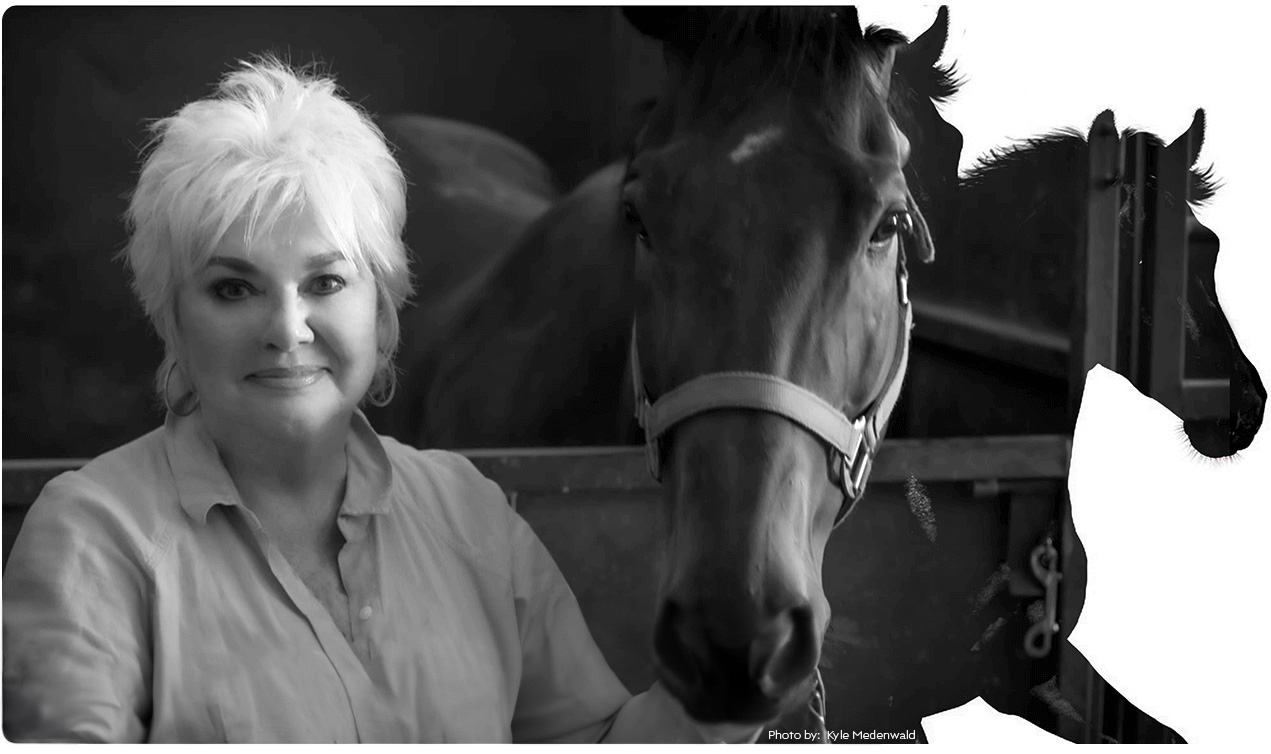 Image of Susan Bala with a horse.